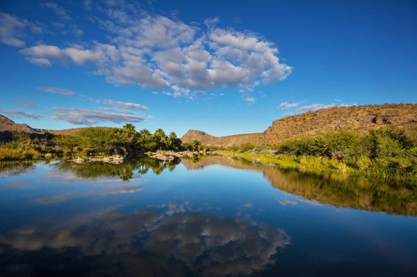 Quels sont les critères pour choisir une résidence de vacances dans une oasis du désert marocain ?